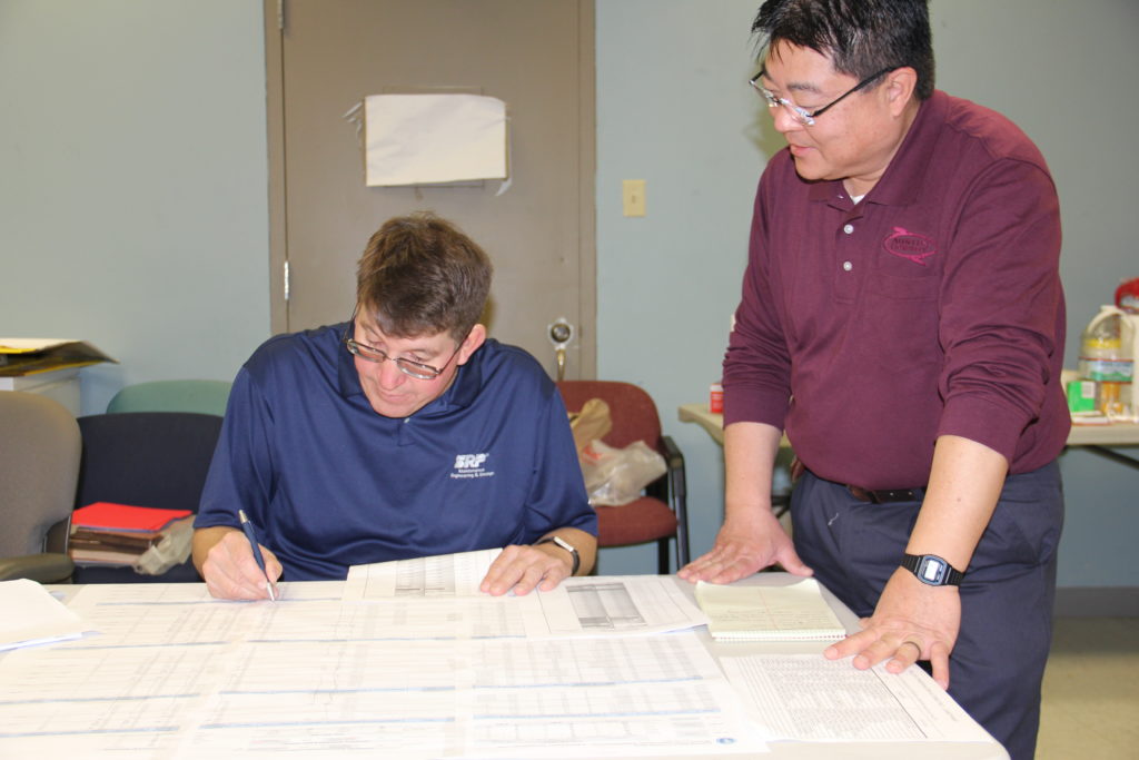 SRP Engineer Rick Hudson and Austin Energy's Danny Ee.