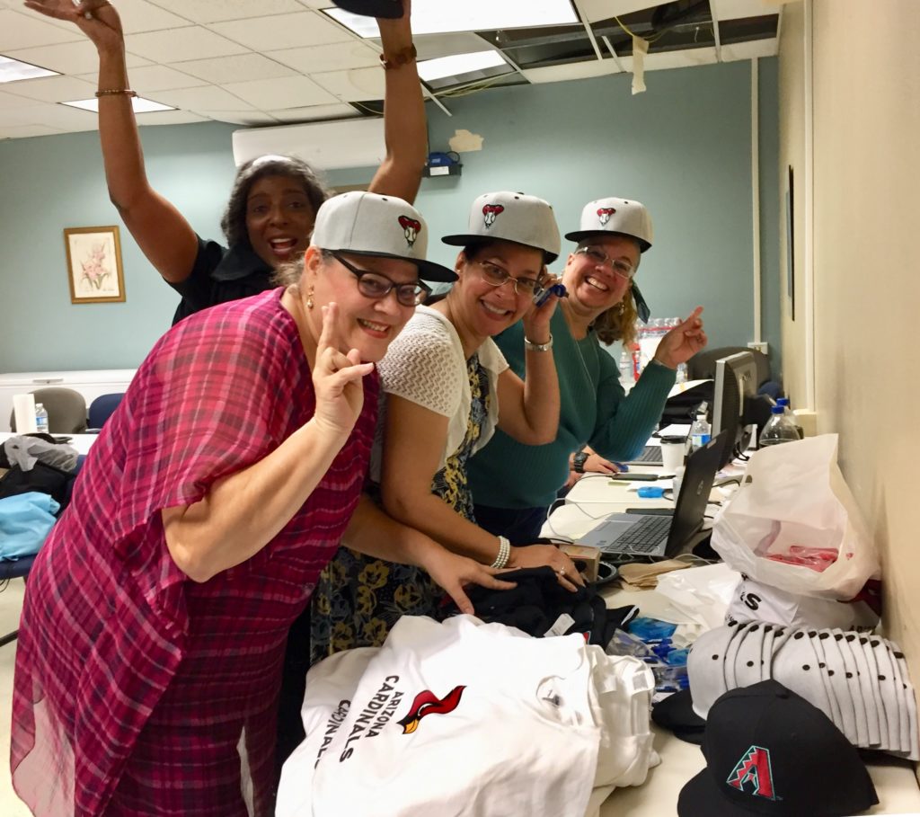 PREPA team takes a rare break to boost morale at the command center.